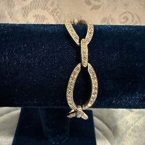 Monet Bracelet. Silver tone with multiple sparkling stones. Clasp closure.